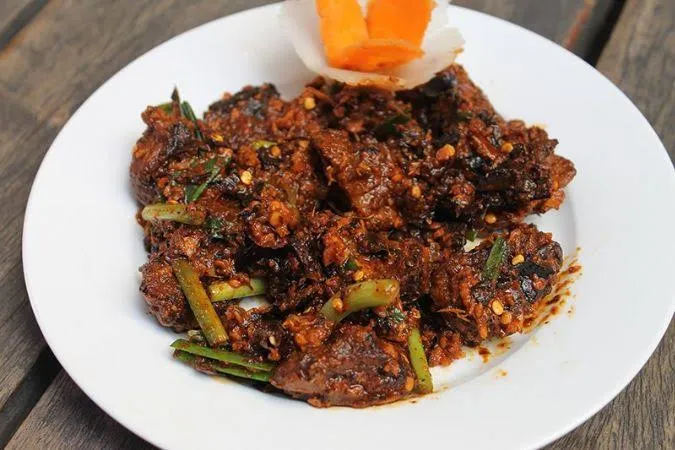 Chhoyla, the spicy grilled buffalo meat dish of Newar cuisine