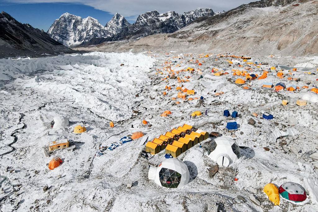 Trekkers on the trail to Everest Base Camp with Himalayan peaks in the background