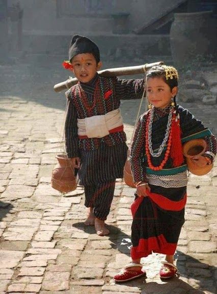 Newar community members in traditional dress at a festival in Kathmandu