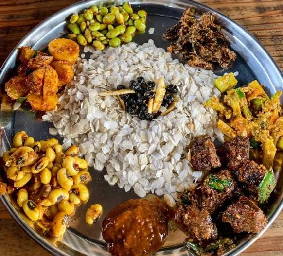 Traditional Newari feast with samay baji, choila, and other dishes