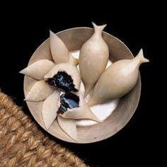 Yomari, the Newari steamed rice-flour dumpling filled with molasses and sesame